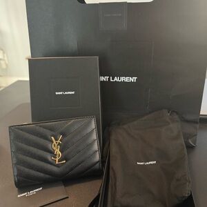 YSL SMALL TWO FOLD WALLET MADE W/METAL-FREE TANNED LEATHER